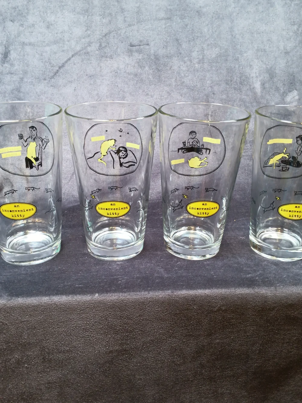 An Inconvenient Kitty Set Of 4 Yellow Graphic Pint Glasses. Hilarious!
